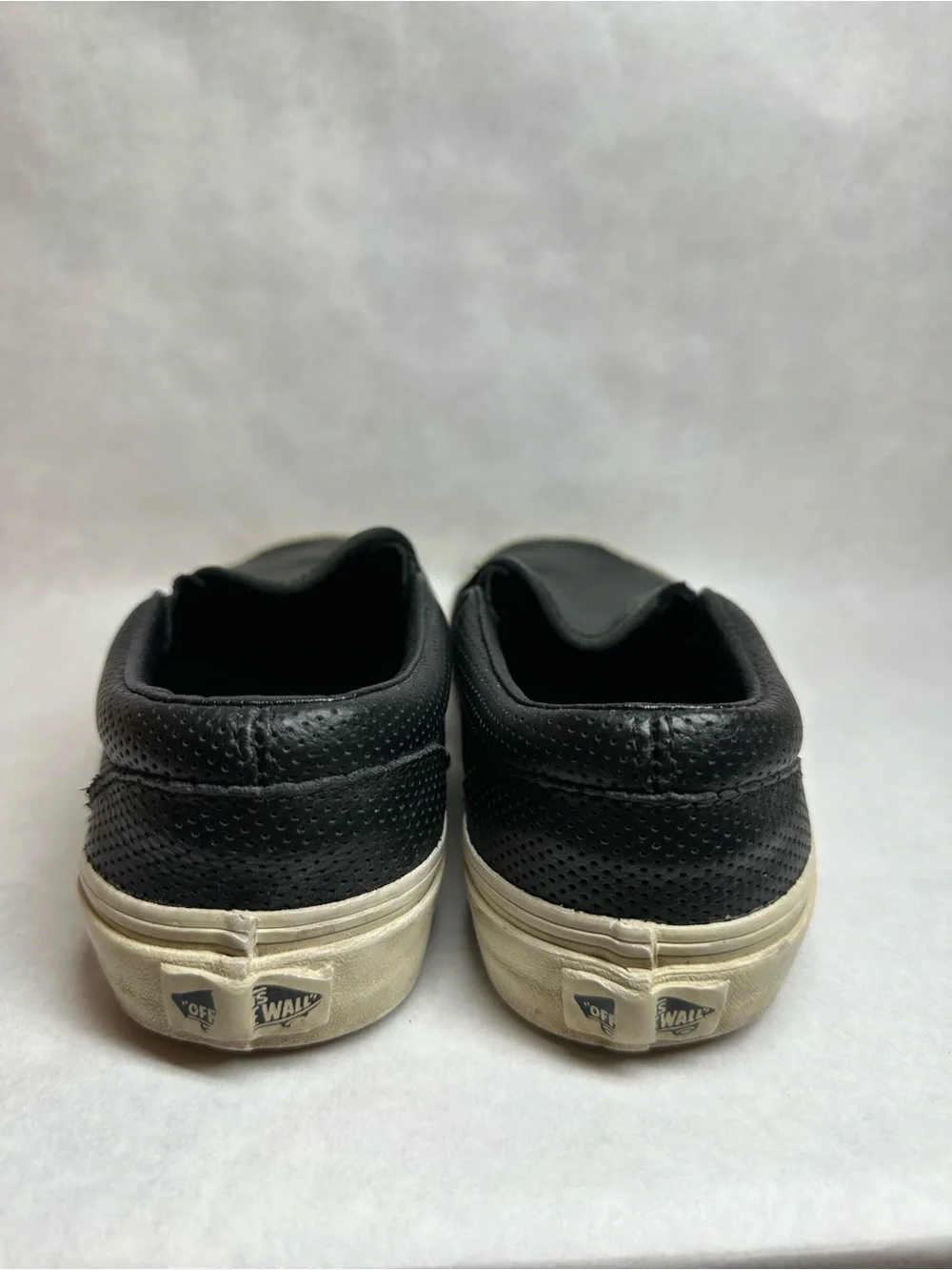Vans Black Perforated Leather Slip-On Sneakers